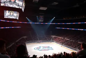 Hockey arena with spotlight on ice