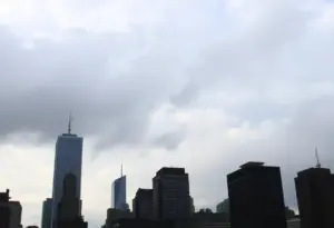 Cloudy weather over New York City with high-rise buildings
