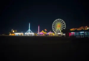 Night view of Playland Park illustrating security concerns